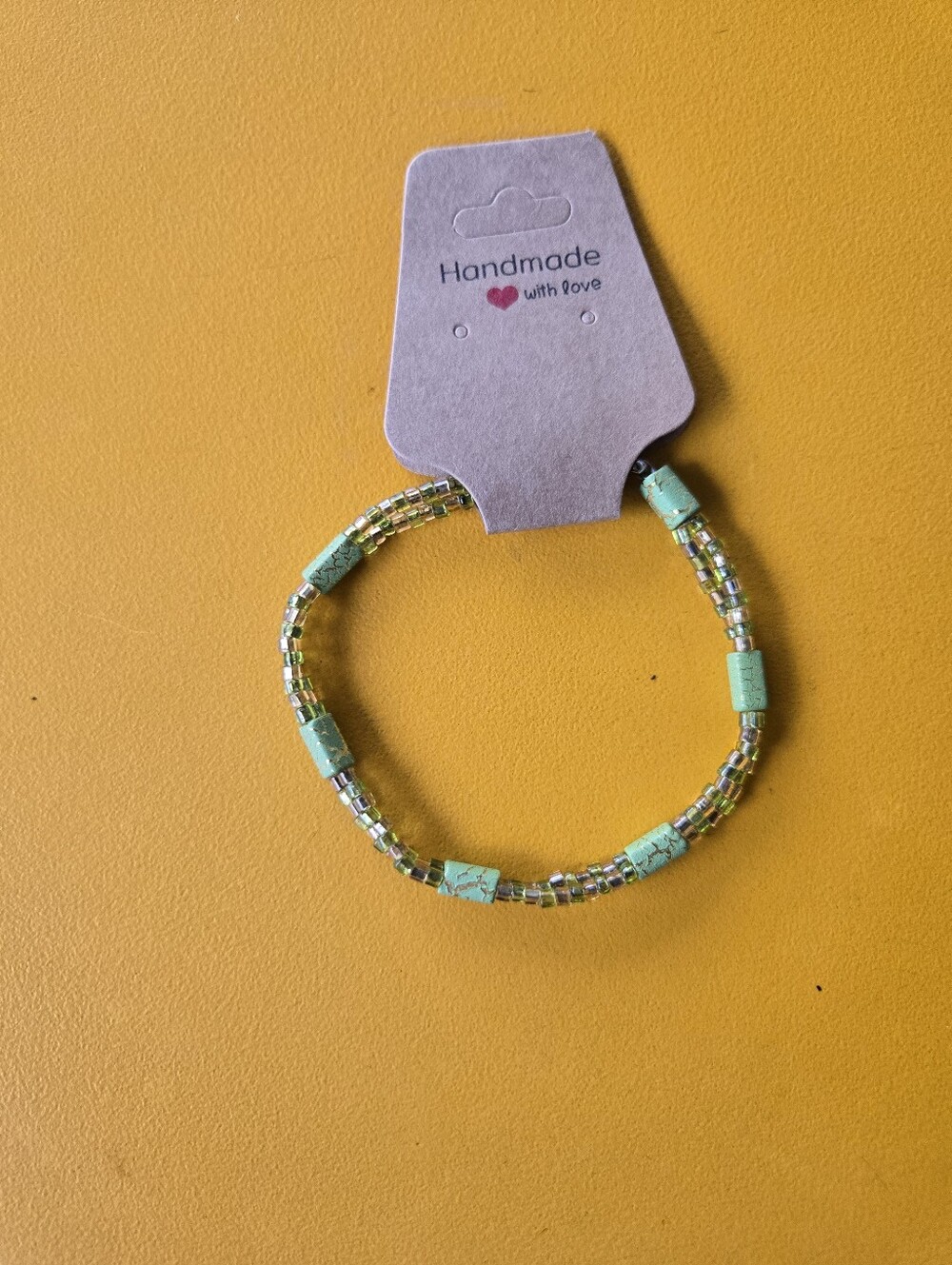 Green Beaded Bracelet with Gold Vein Accent